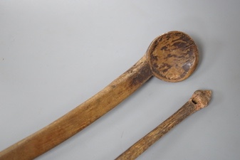 Two early treen spoons 20cm